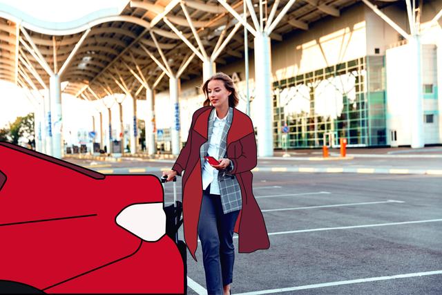 Woman outside airport with case