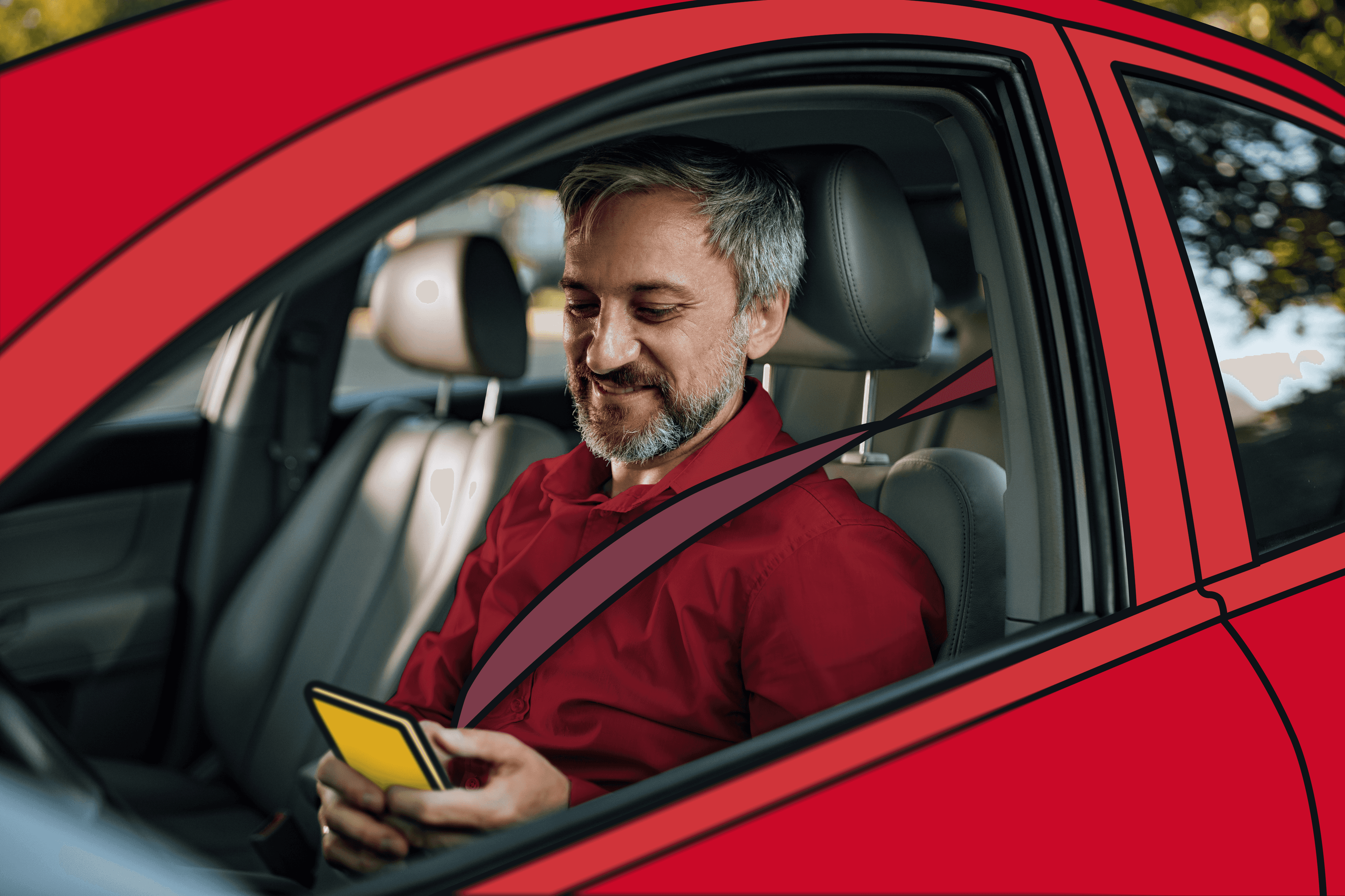 employé satisfait assis dans sa voiture et regardant son téléphone