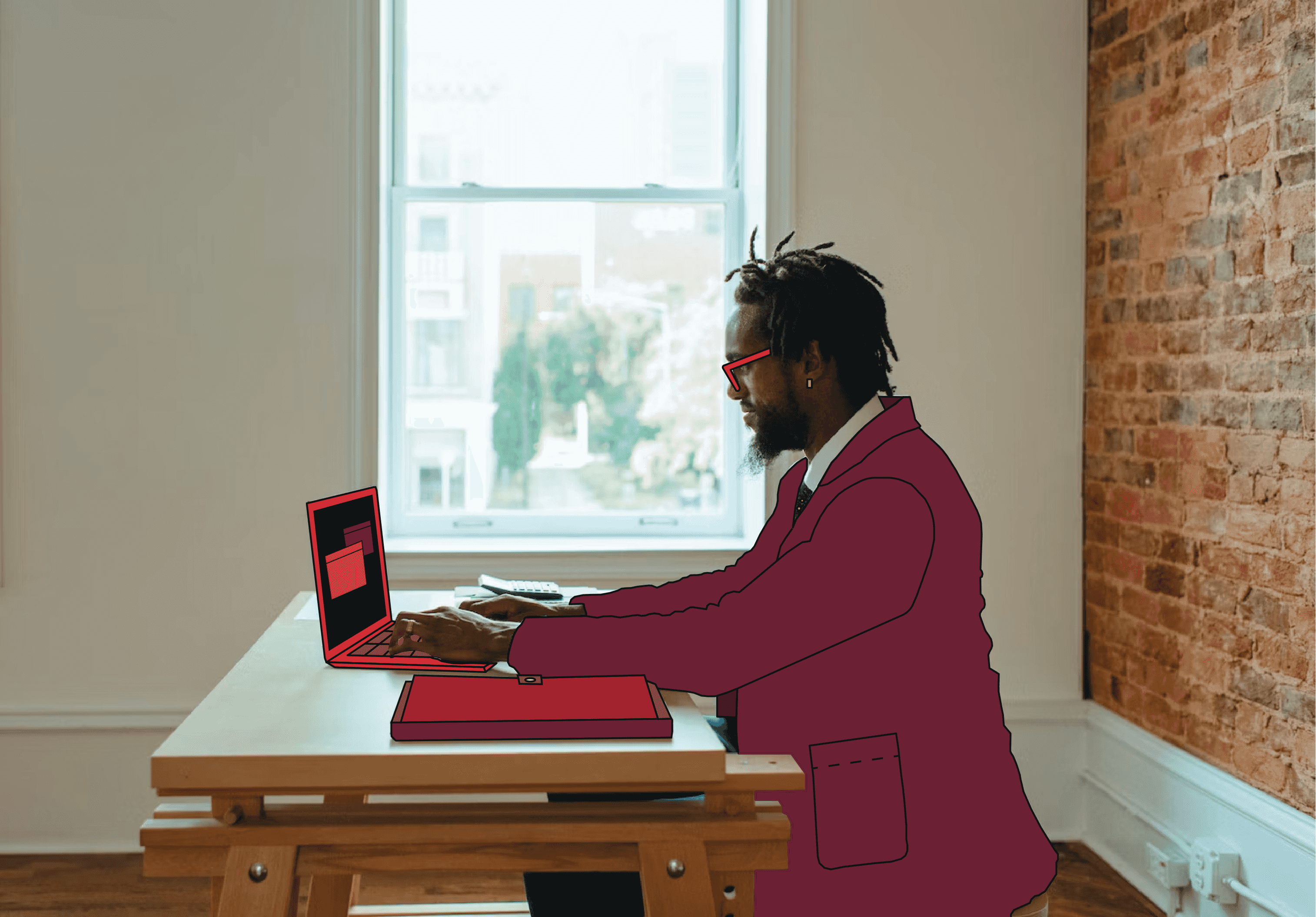 Un hombre trabaja con su portátil