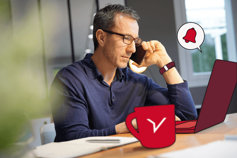 Person with laptop and coffee