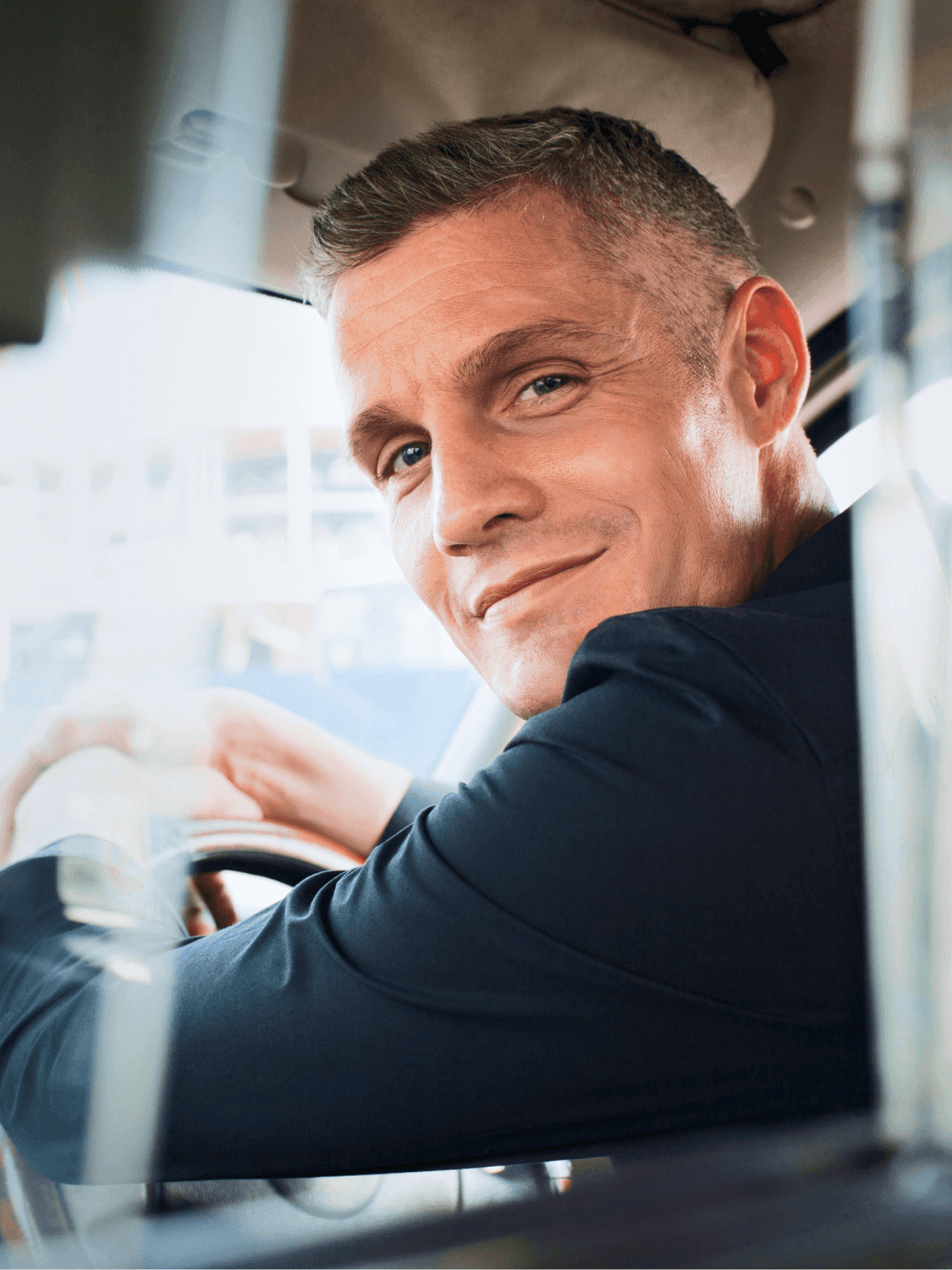 Taxi driver standing next to his car