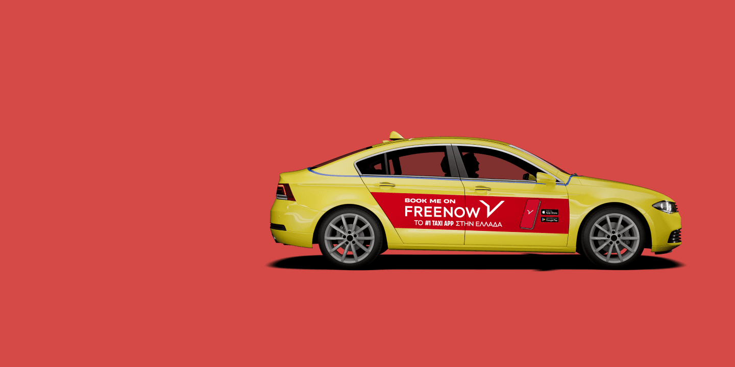 Taxi with FREENOW sticker on doors