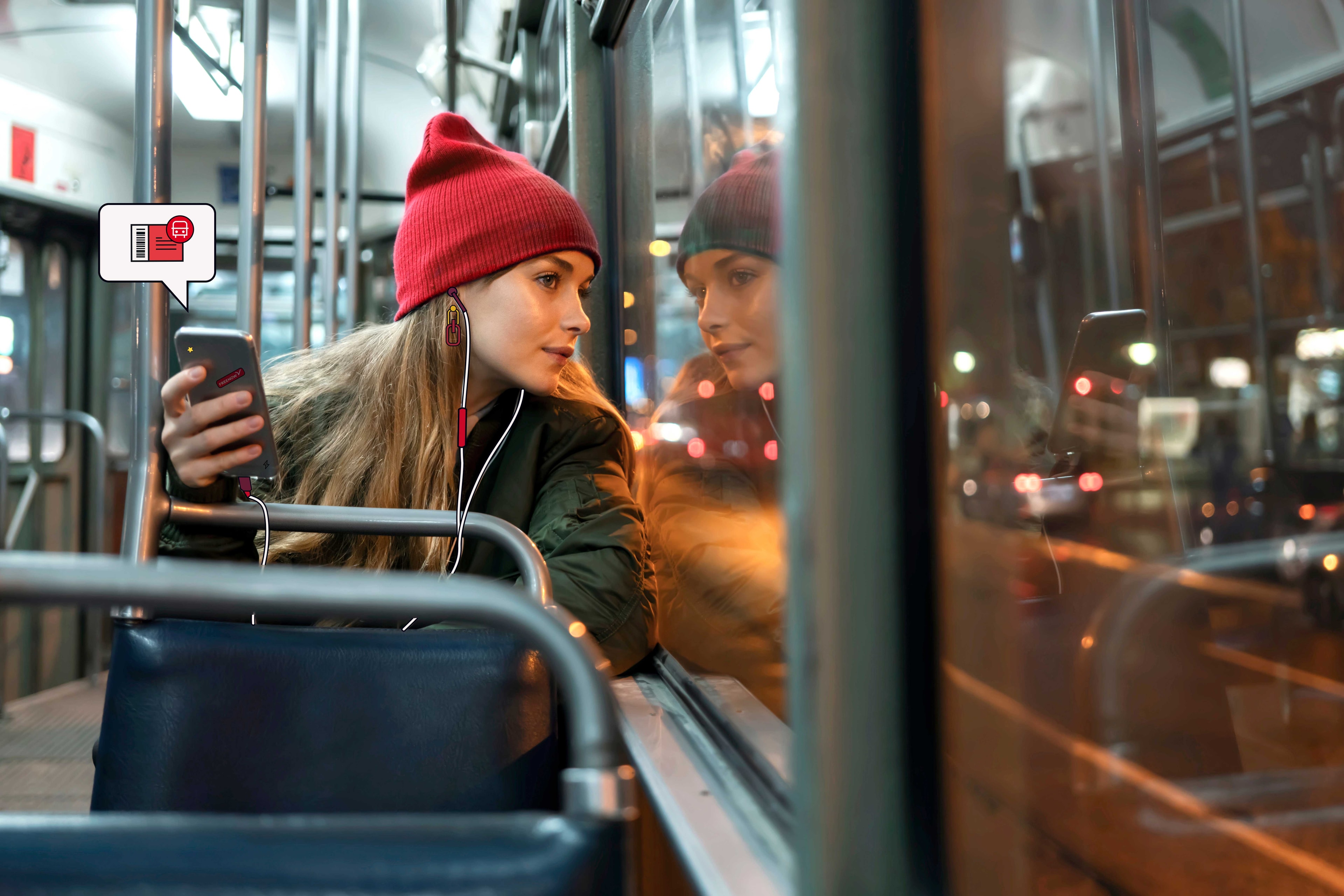 An employee sitting on a bus looking the window. She can buy her public transport ticket with the Freenow Mobility Budget.