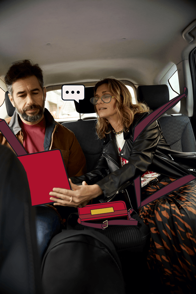 Zwei Geschäftsreisende im Taxi