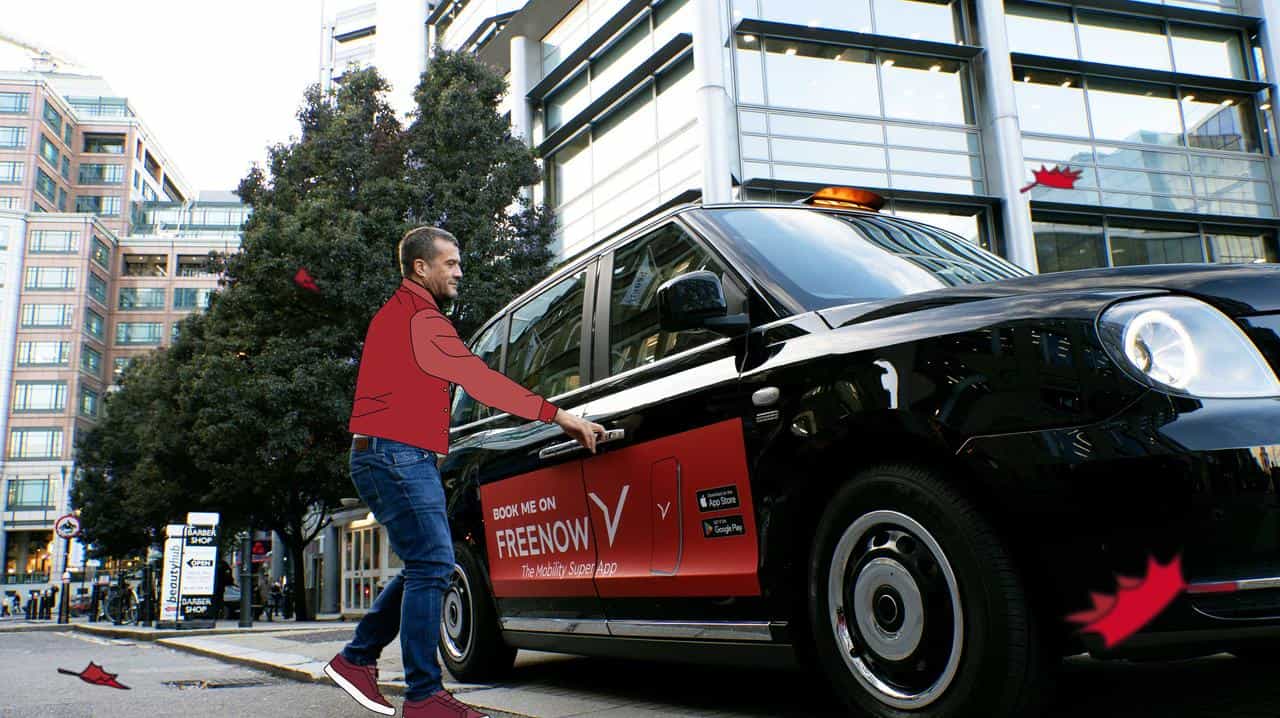 Man getting into taxi